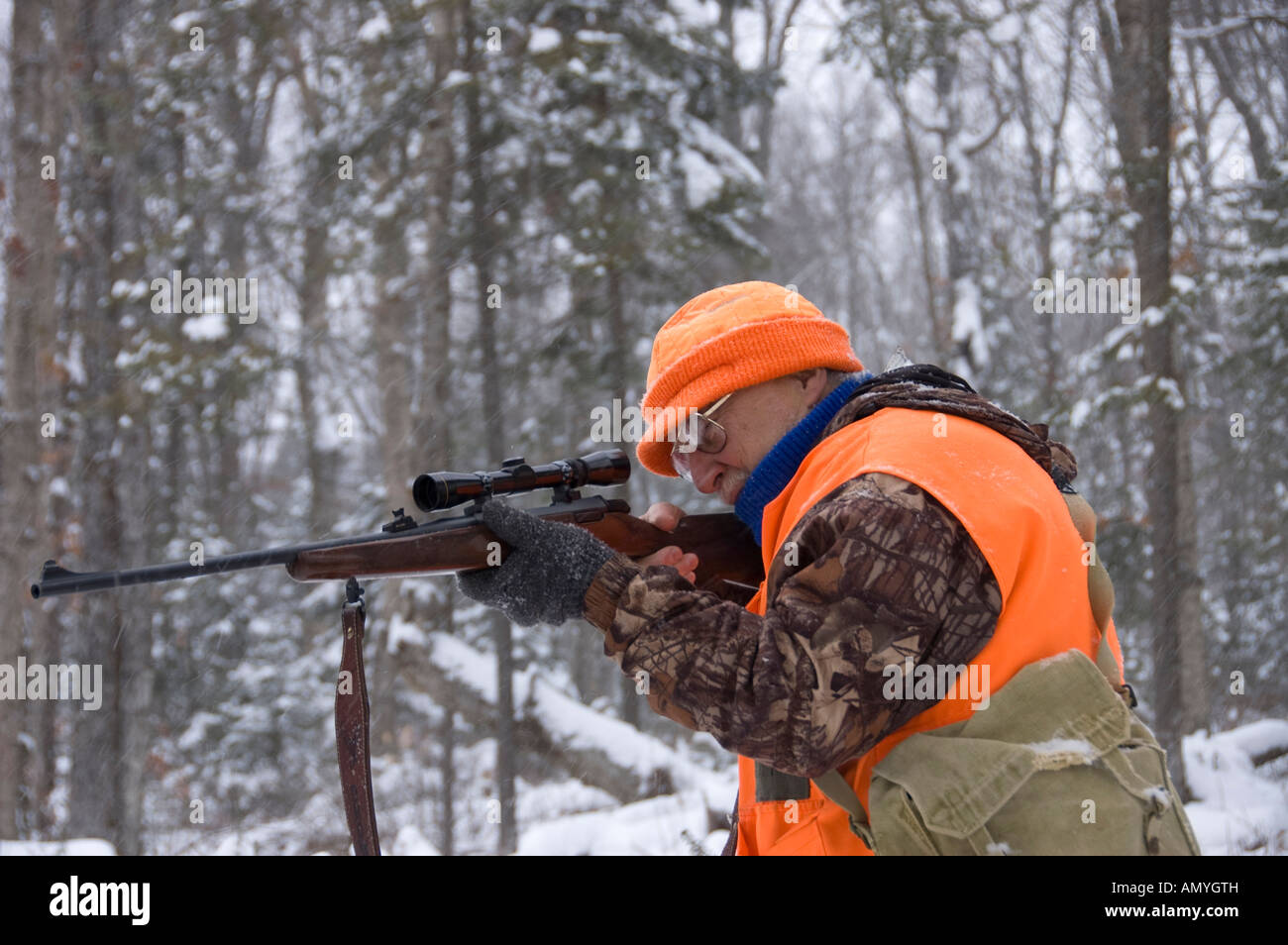 Deer hunter aiming gun in hires stock photography and images Alamy