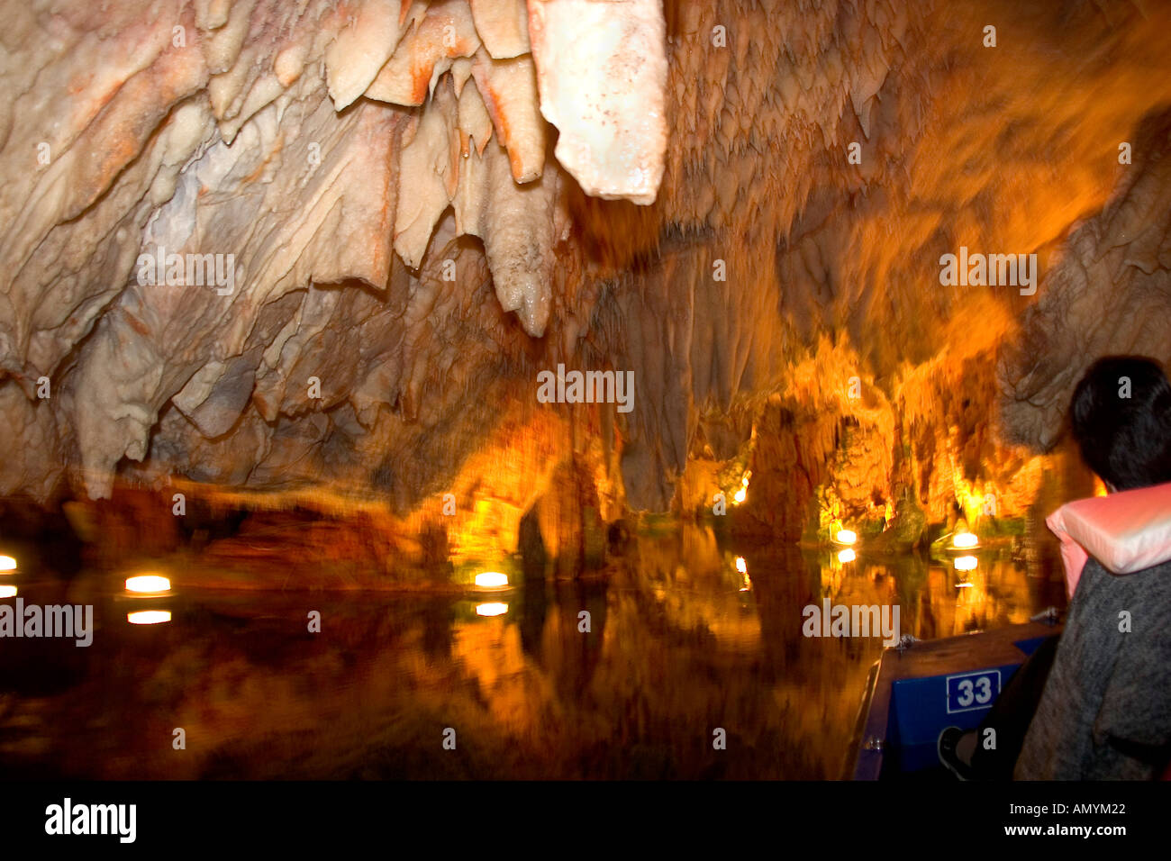 boat tour in the dripstone caves of Dirou Peloponnese Greece Stock Photo