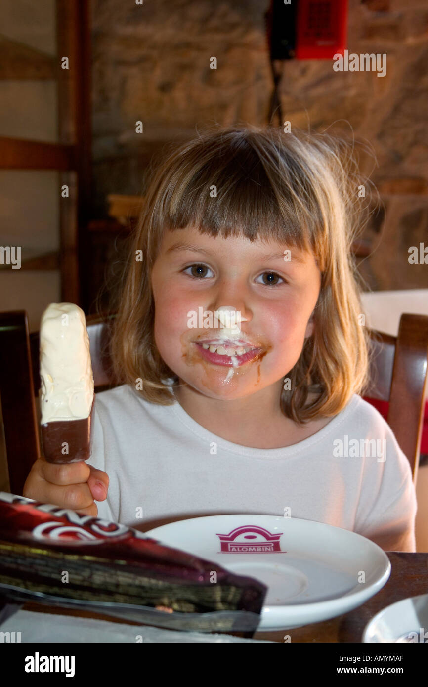 Kind schleckt Eis child eating Icecream Greece Stock Photo