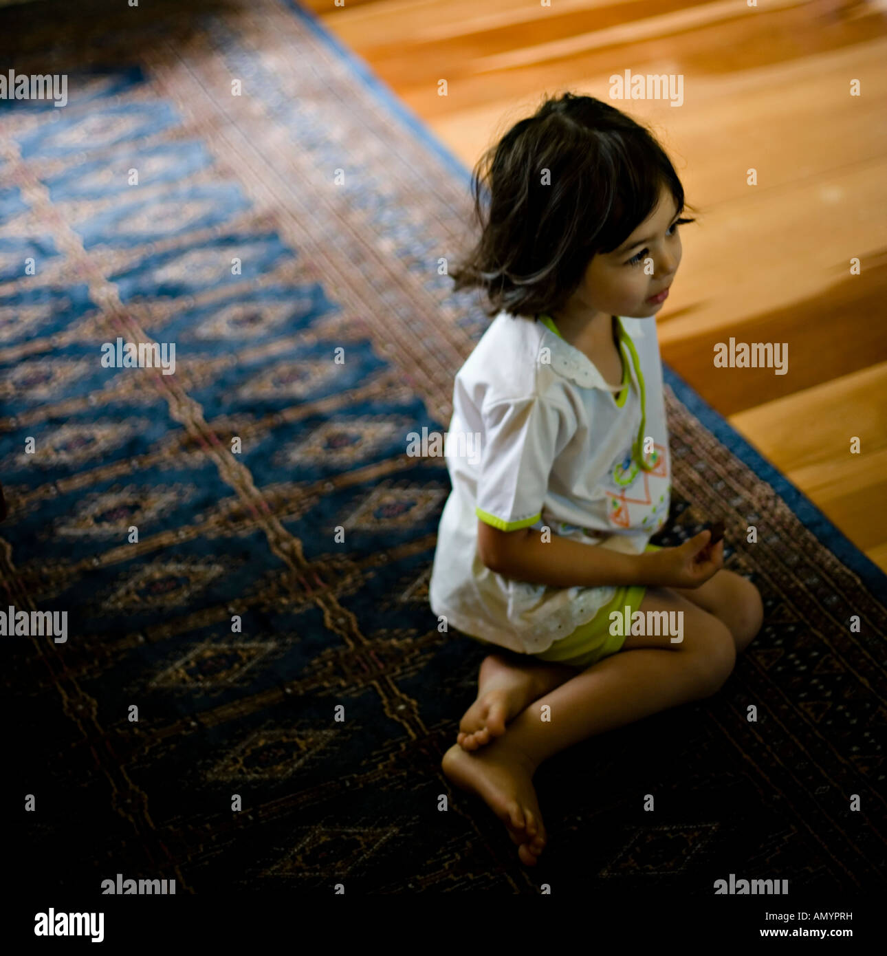Girl watches TV Stock Photo Alamy