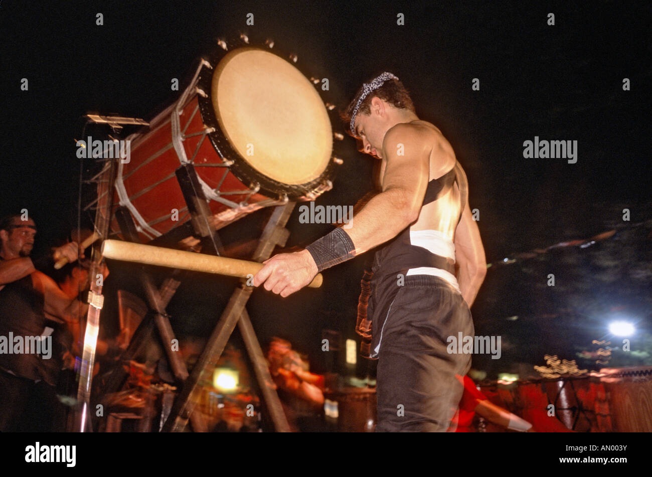Japanese taiko drummer performing at a neighborhood festival in Coconut