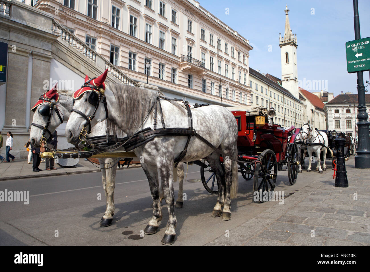 Sightseeing Horse Buggys parked outside the Albertina Museum in downtown Vienna, Austria, Europe Stock Photo