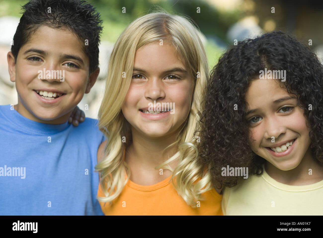Portrait of a boy with two girl Stock Photo - Alamy