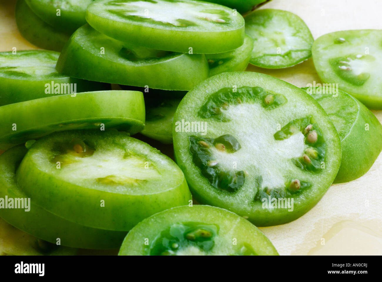Sliced green tomatoes Stock Photo Alamy