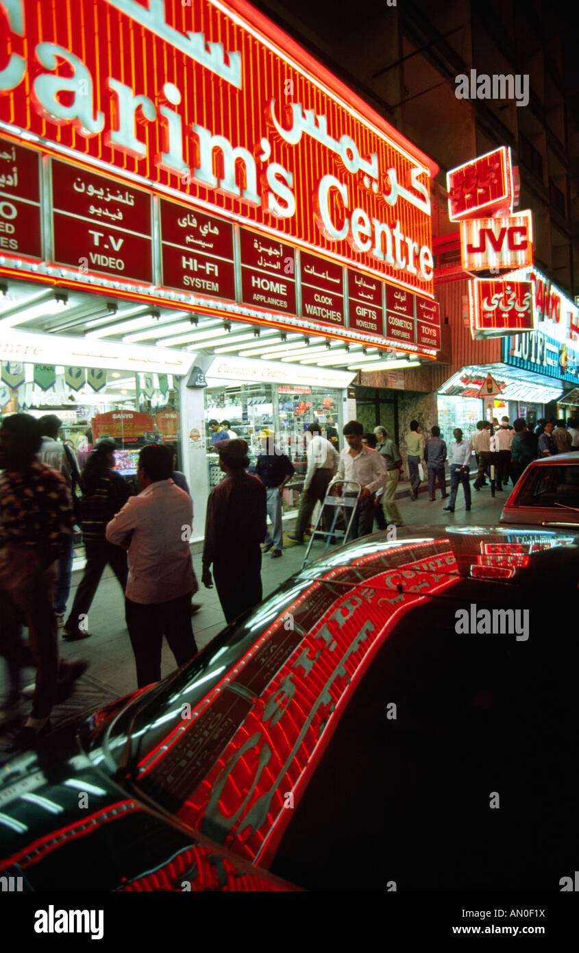 UAE Dubai Al Fahidi Street electronics area at night reflected neon signs Stock Photo Alamy