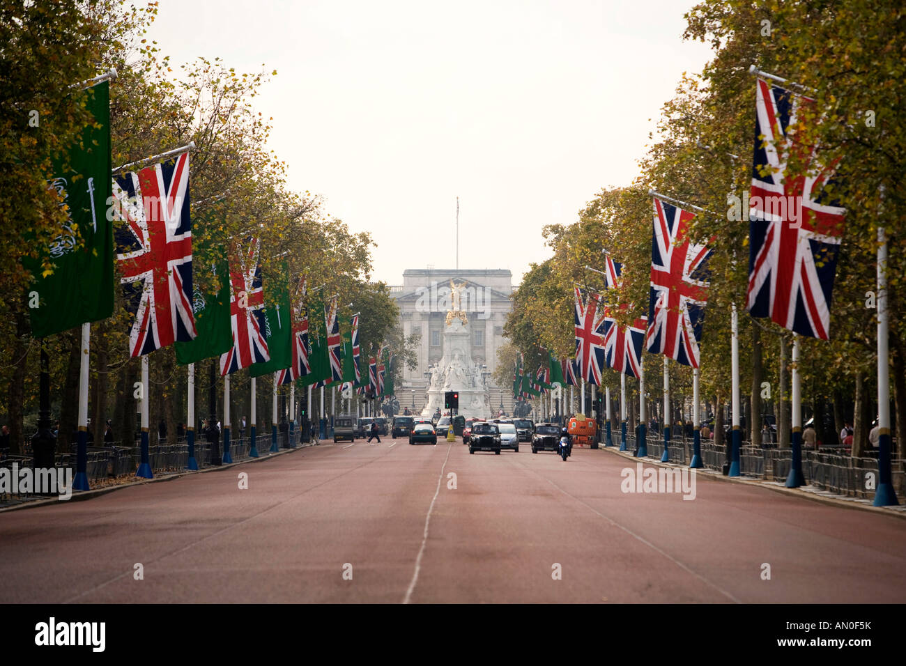 UK London The Mall lined with Union Jack flags looking down to Buckingham Palace Stock Photo