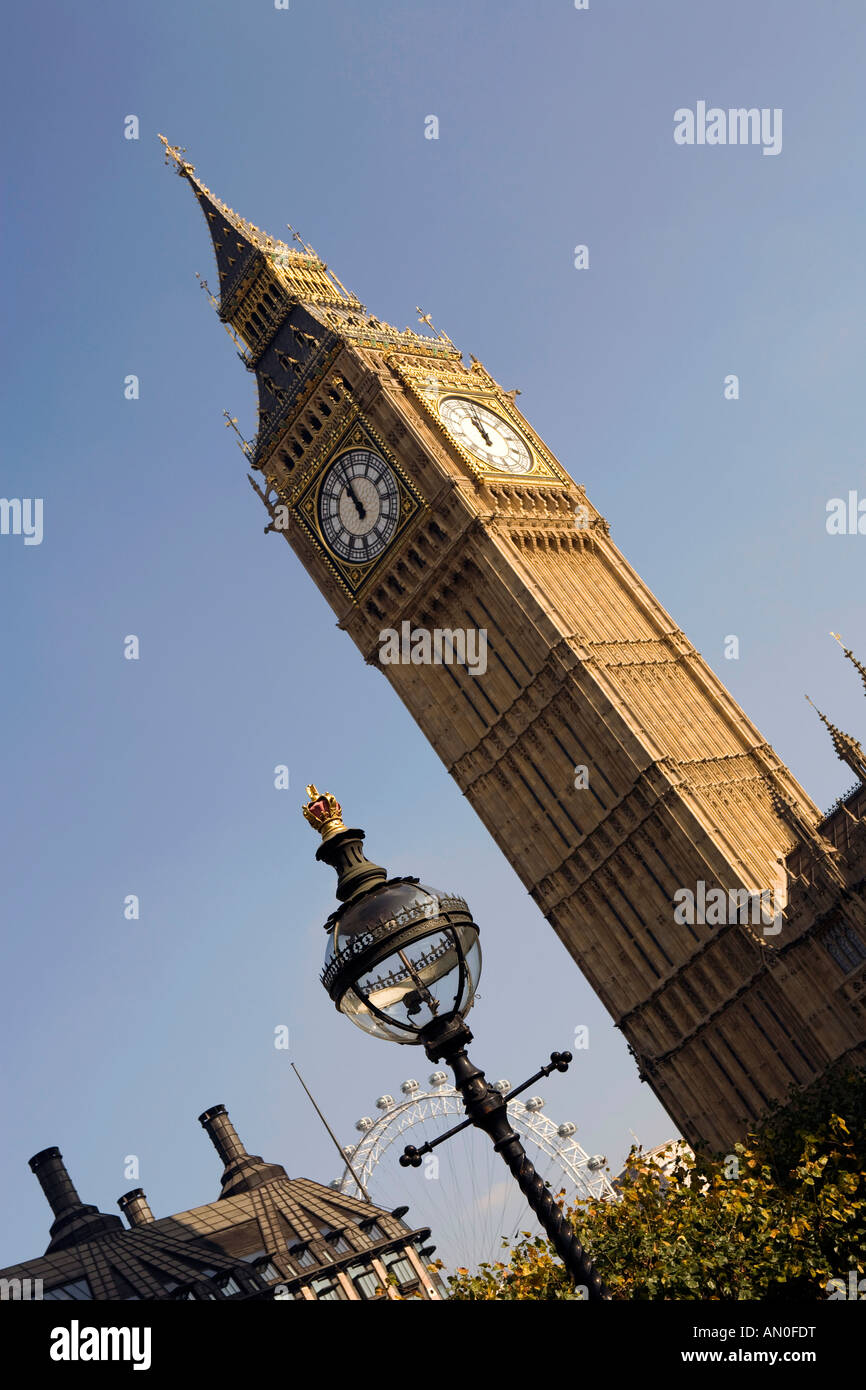 UK London Big Ben St Stephens Tower and London Eye from inside Palace of Westminster grounds Stock Photo