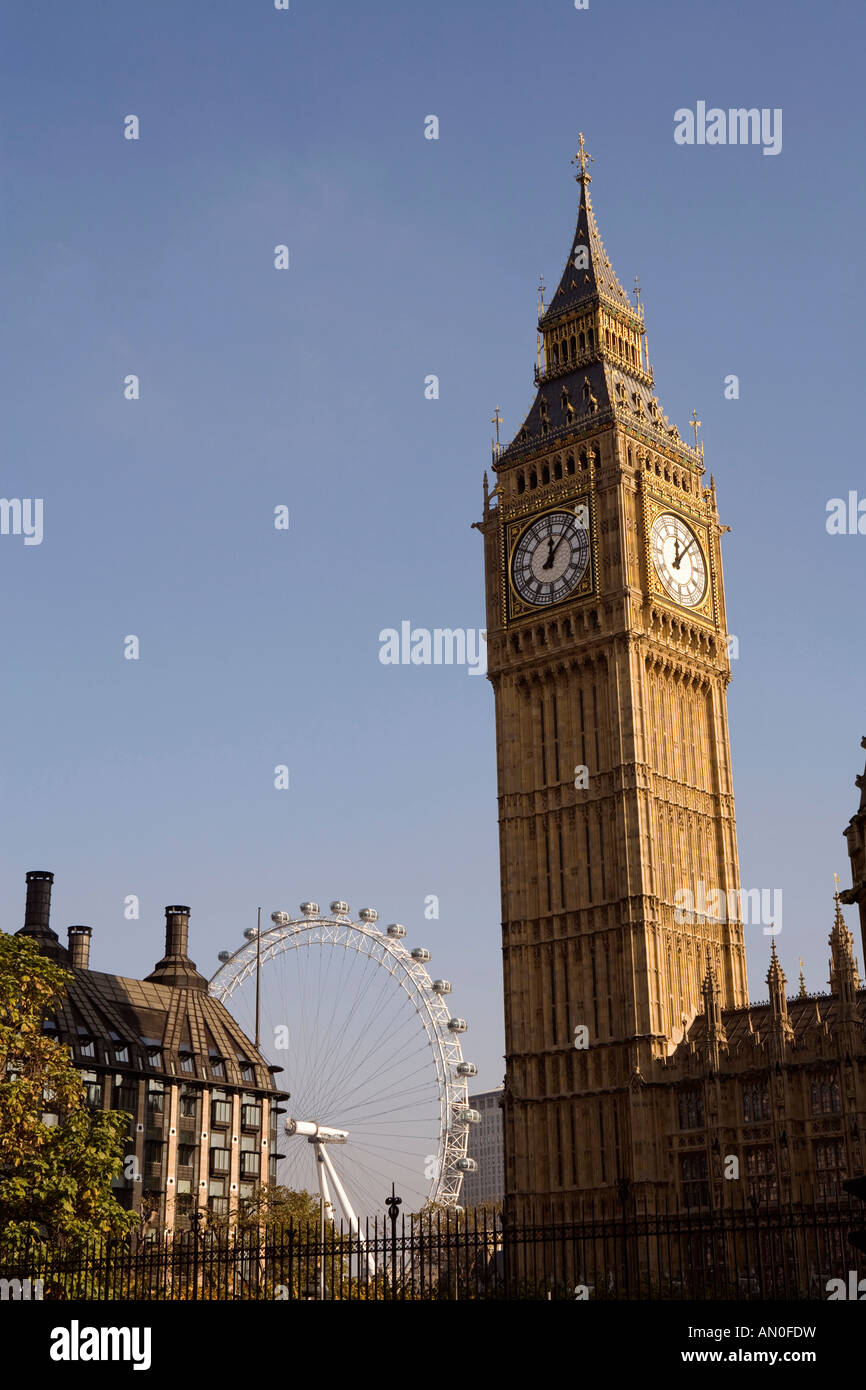 UK London Big Ben St Stephens Tower and London Eye from inside Palace of Westminster grounds Stock Photo