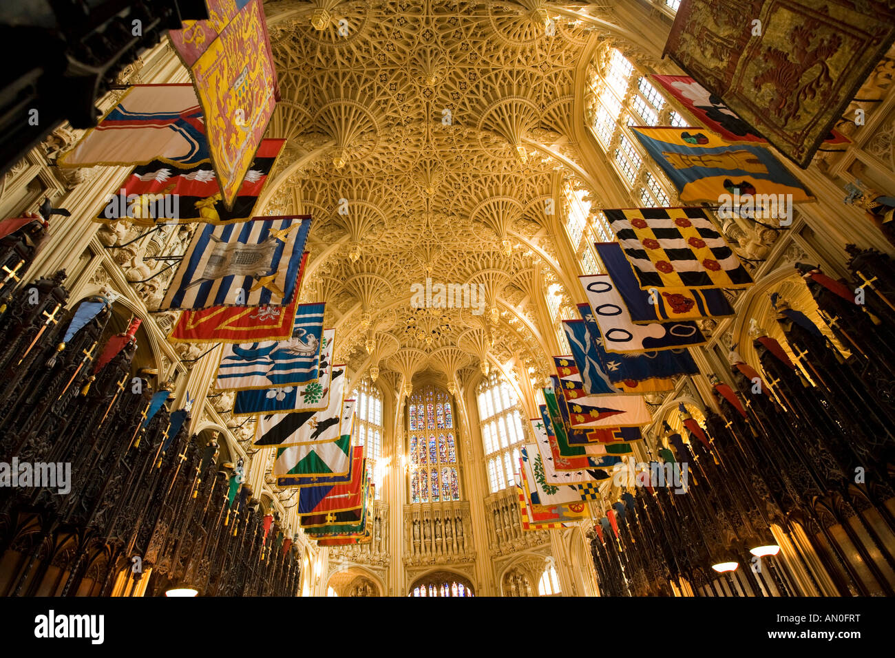 UK London Westminster Abbey Lady Chapel constructed by Henry VII fan vaulted roof and heraldic flags banners Stock Photo