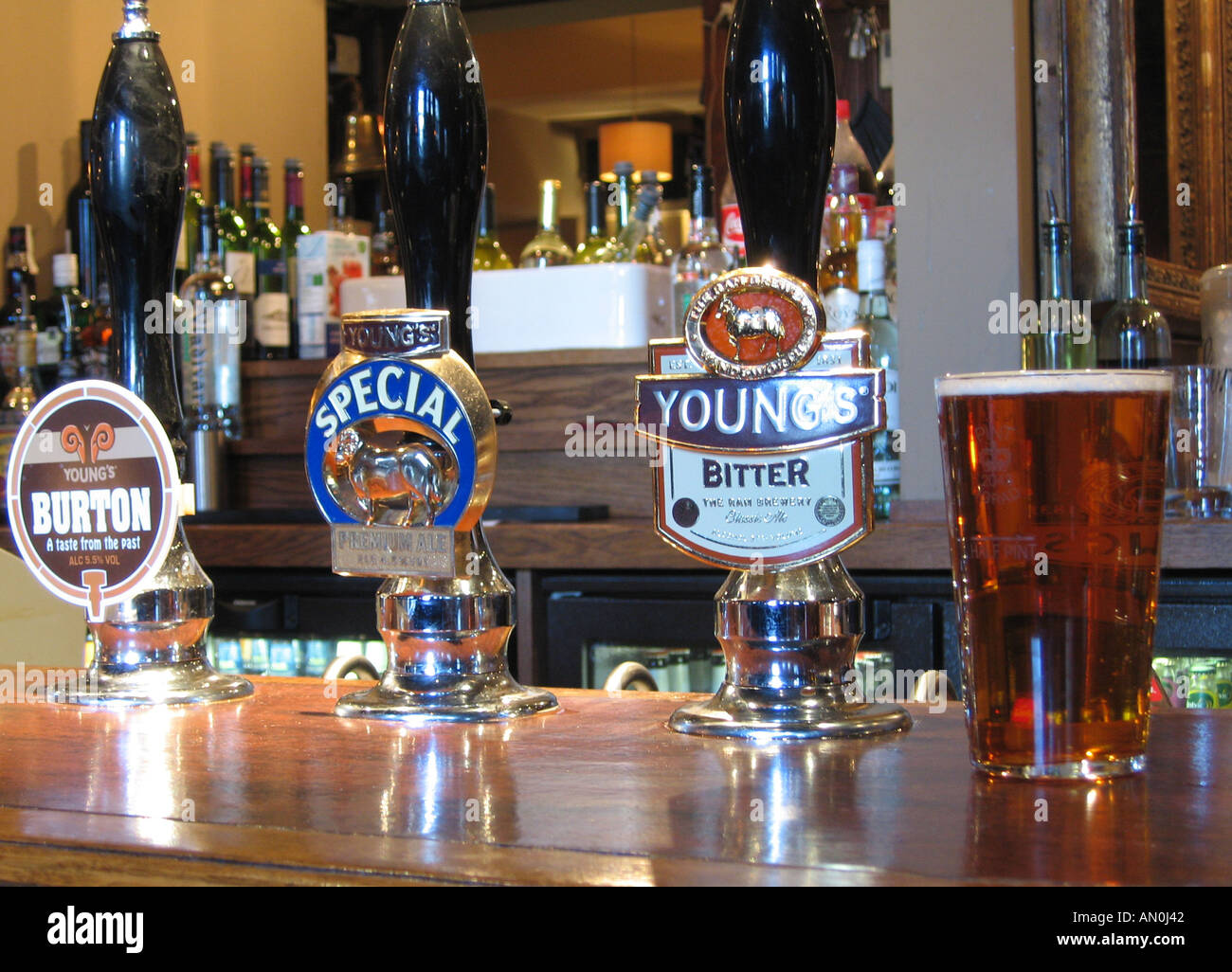 Real Ale Hand Pumps in a Youngs Public House Stock Photo