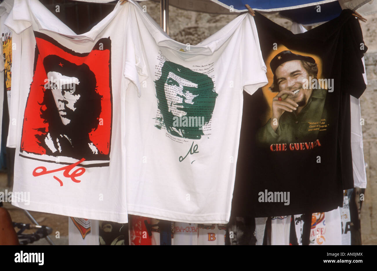 Printed t-shirts showing image of Che Guevara hanging from market stall in Havana, Cuba. Stock Photo