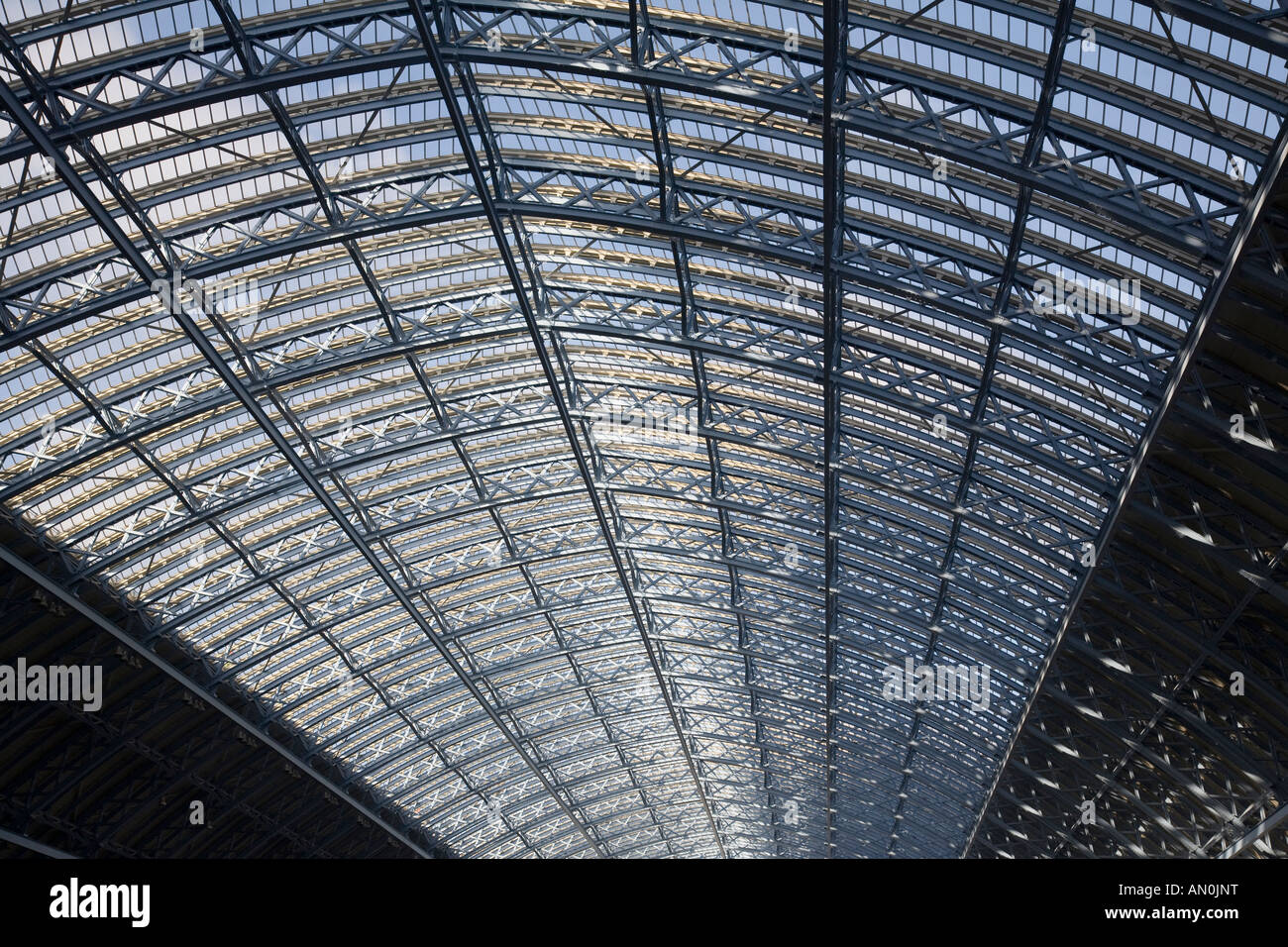 A view of the iron framework supporting the roof of the recently refurbished St Pancras International train station, London. Stock Photo