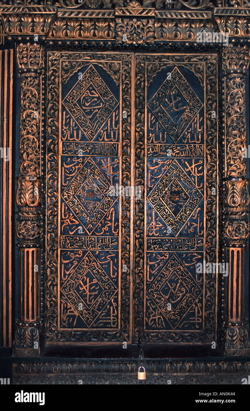 Architectural detail House of Wonder Detail of carved door with Arabic inscriptions Stone Town Zanzibar Tanzania East Africa Stock Photo
