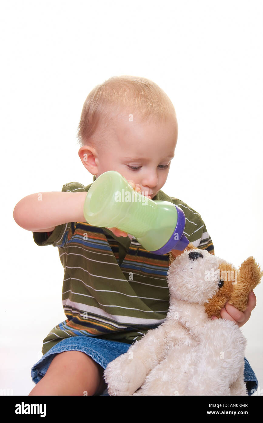 stuffed animals feed a child