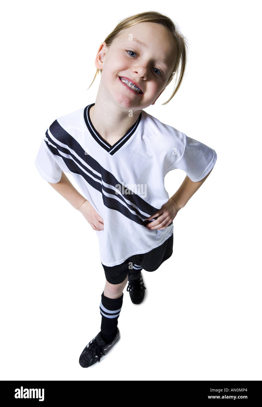 Portrait of a girl standing with hands on hips Stock Photo - Alamy