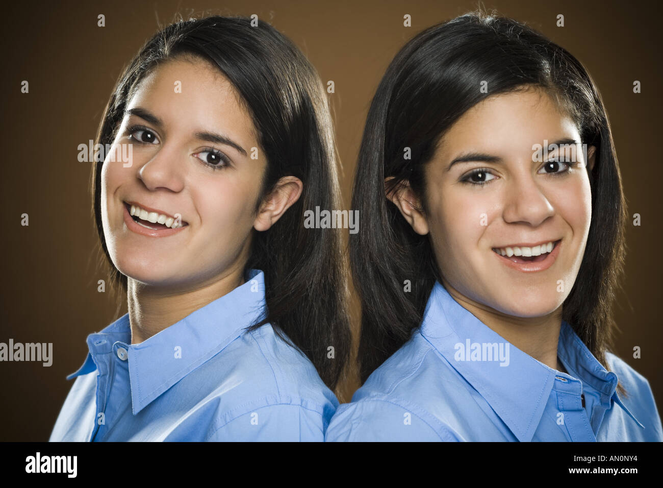Portrait of two teenage girls smiling Stock Photo - Alamy