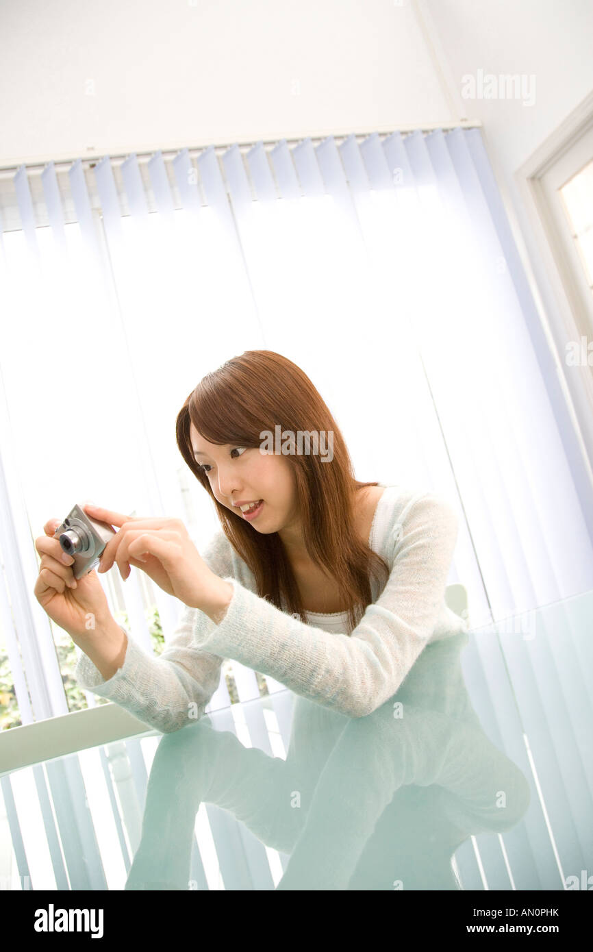 Digital camera woman shooting hi-res stock photography and images - Alamy