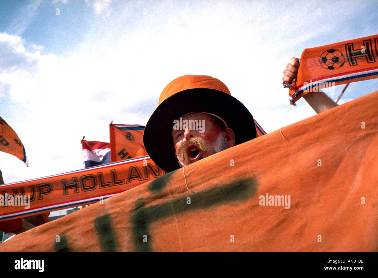 Dutch football supporters celebrating outside Wembley Stadium prior to England versus Holland match in Euro '96. Stock Photo