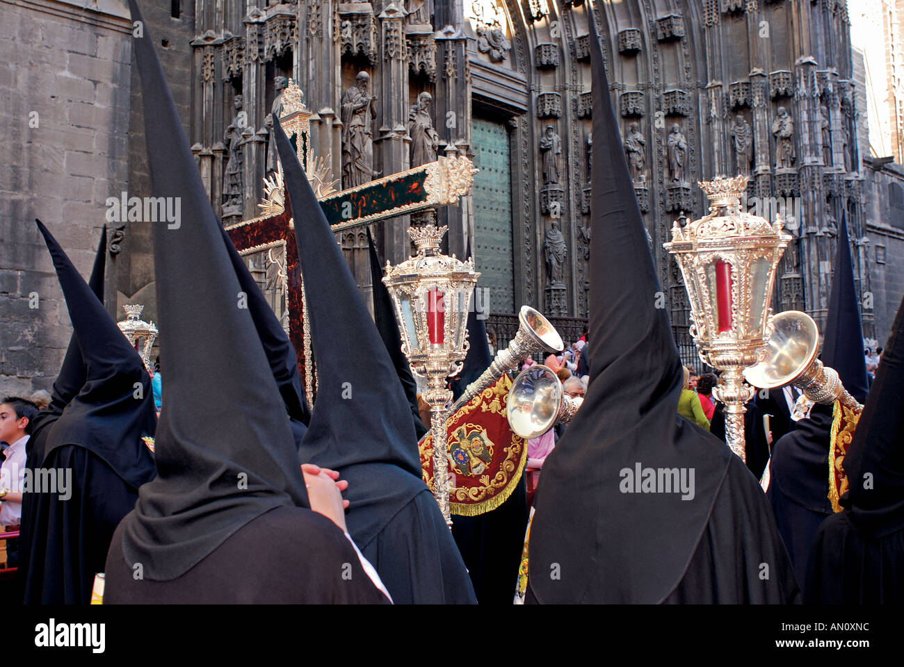 Easter procession around the Cathedral, Semana Santa, Sevilla, Andalusia, Spain Stock Photo