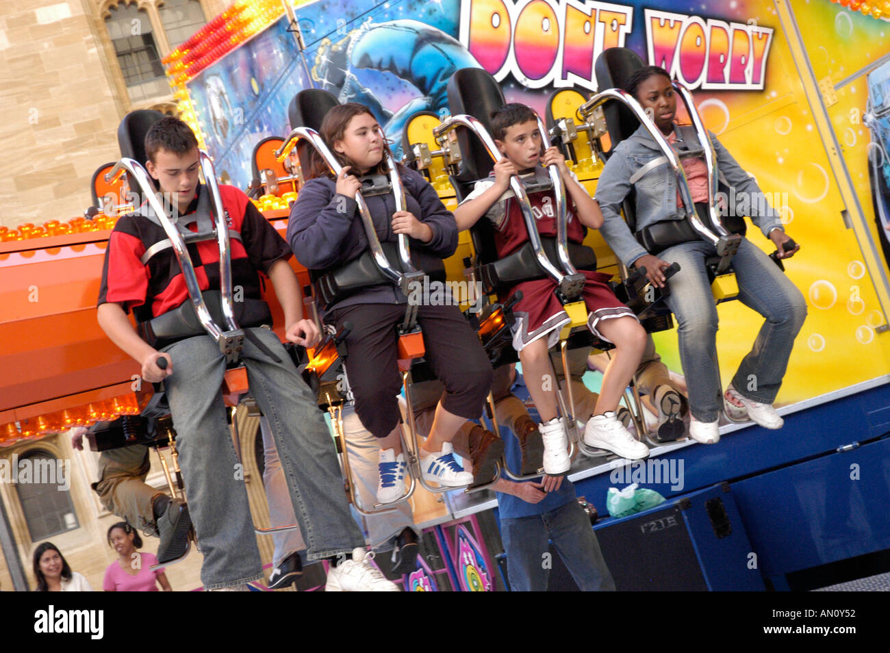 Children enjoying a funfair ride hi-res stock photography and images ...