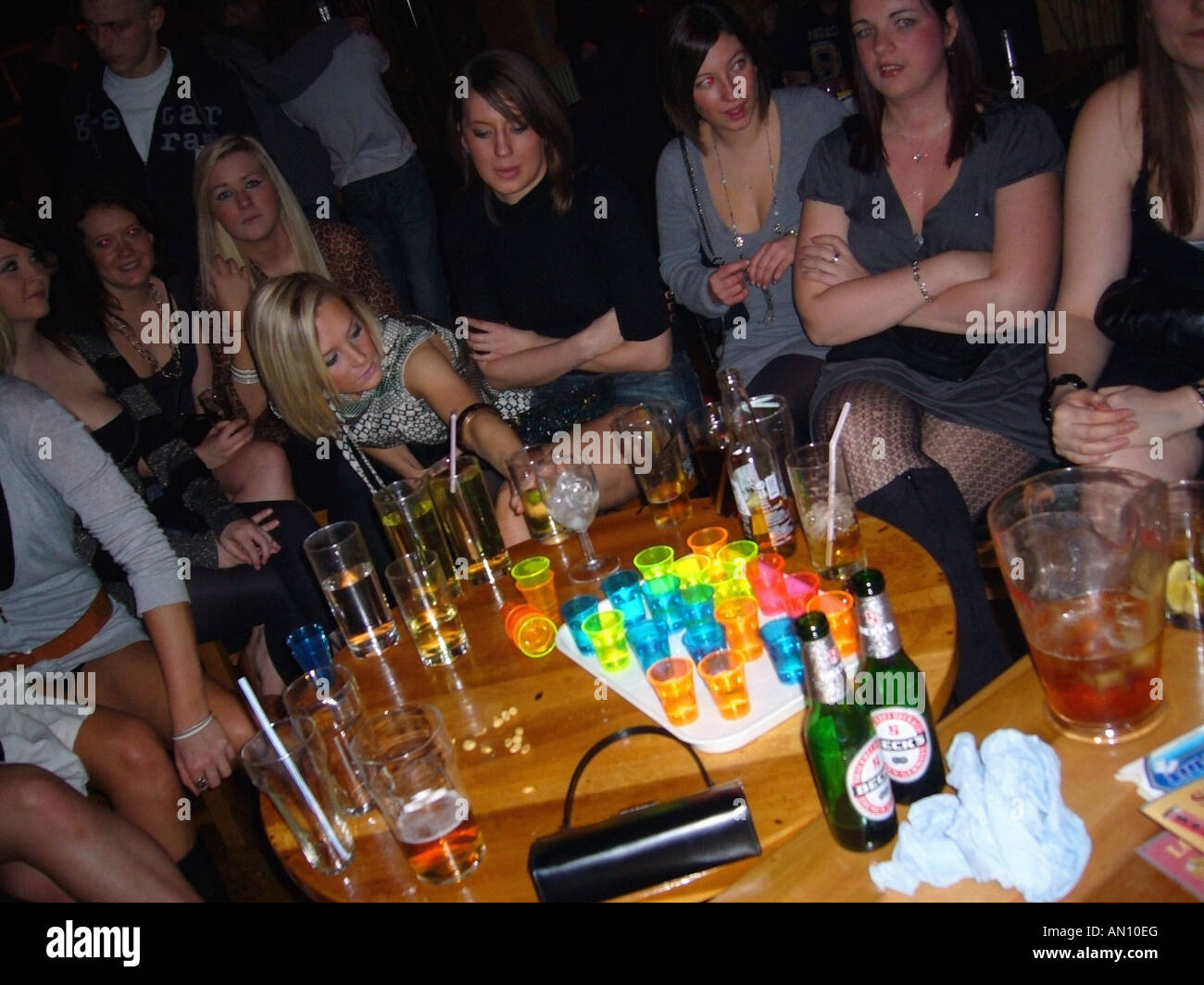 young women binge drinking Stock Photo - Alamy