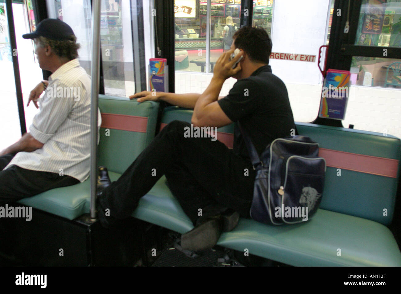 Miami Beach Florida,Electrowave,electric,public bus service,riders,passenger passengers rider riders,transportation,commuters,seats,visitors travel tr Stock Photo