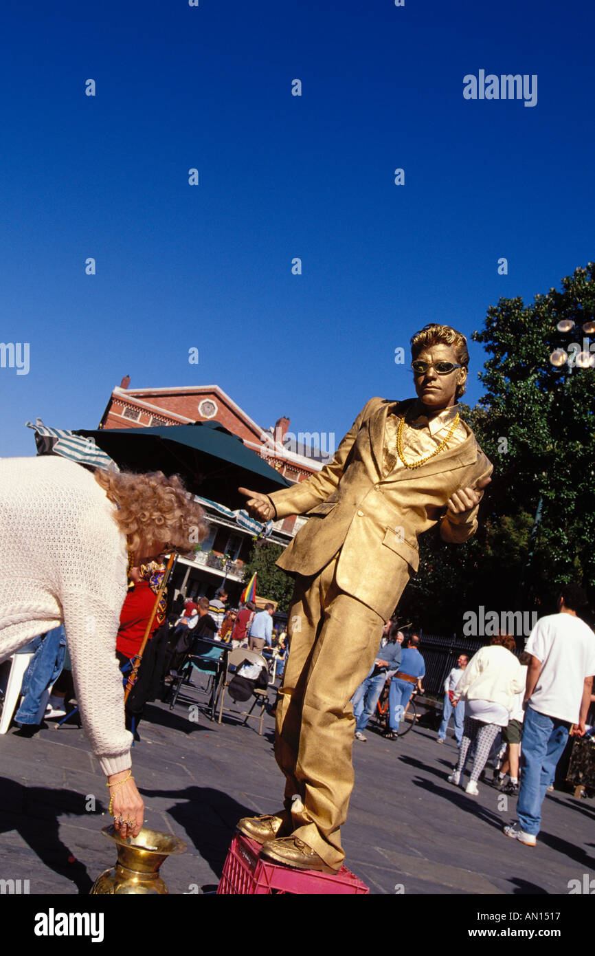 Mime Painted With Gold Perfroms On Corner Of Jackson Square In French Quarter During Mardi Gras New Orleans LA Stock Photo