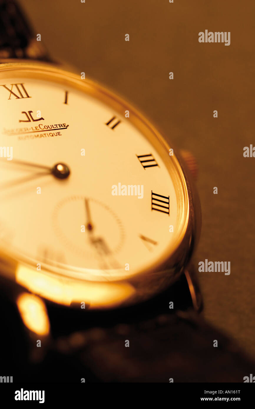 Golden luxury watch cropped selective focus Stock Photo