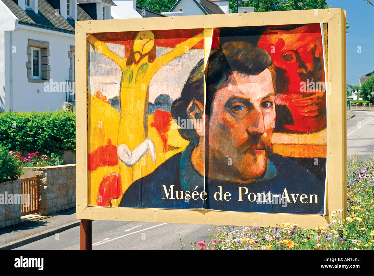 Advertisement of the Arts Museum with portrait of Paul Gaugain, Pont-Aven,  Brittany, France Stock Photo