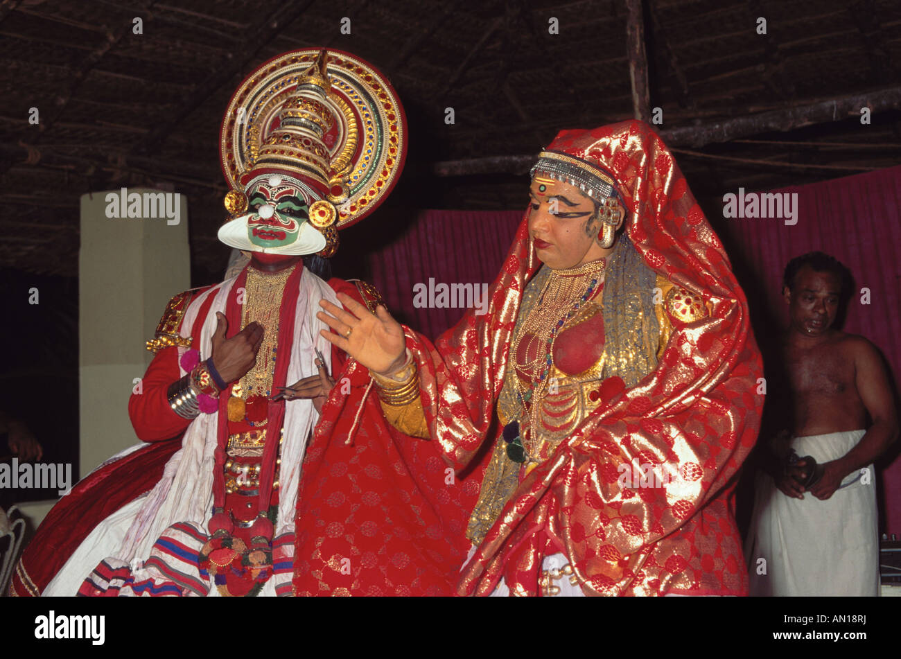 Bright costumes and vivid masks worn by Kathakali dancers at Cochin, Kerala, India. Stock Photo