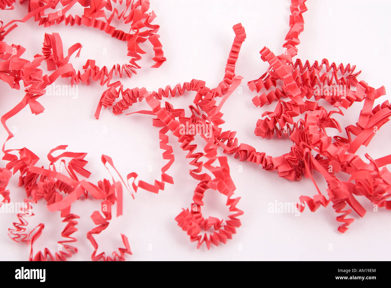 Red shred paper isolated on white background Stock Photo