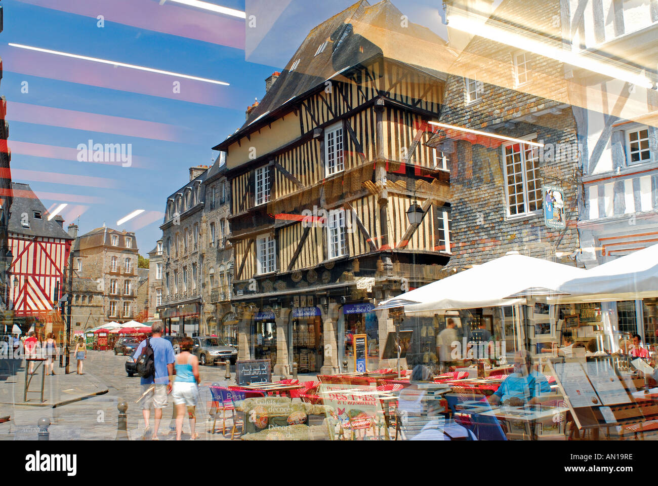 Window Reflection in the historic centre, Dinan, Brittany, France Stock Photo