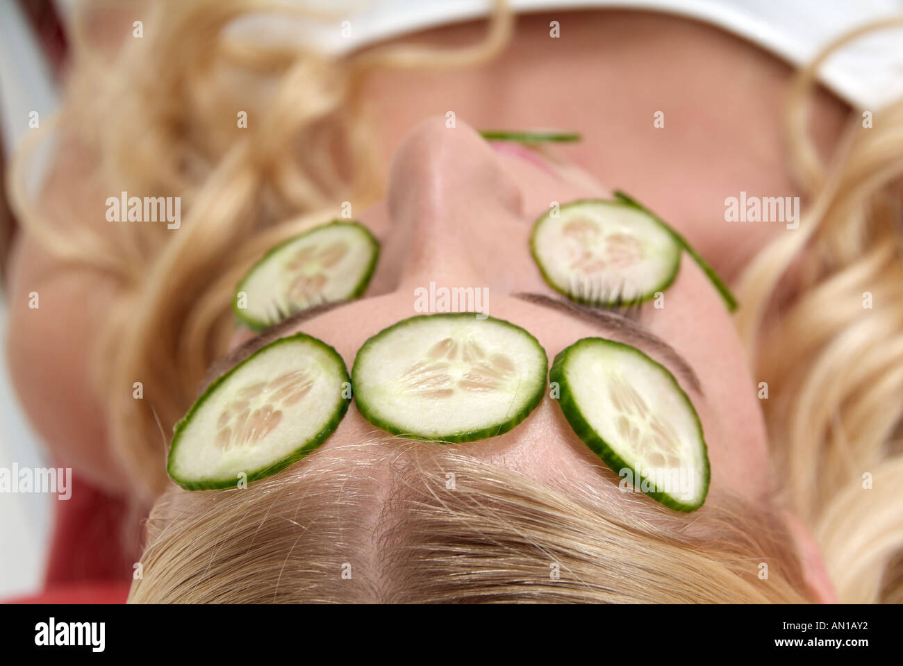 Beauty woman Lifestyle cucumber bodycare, face, blonde woman adults skincare Stock Photo