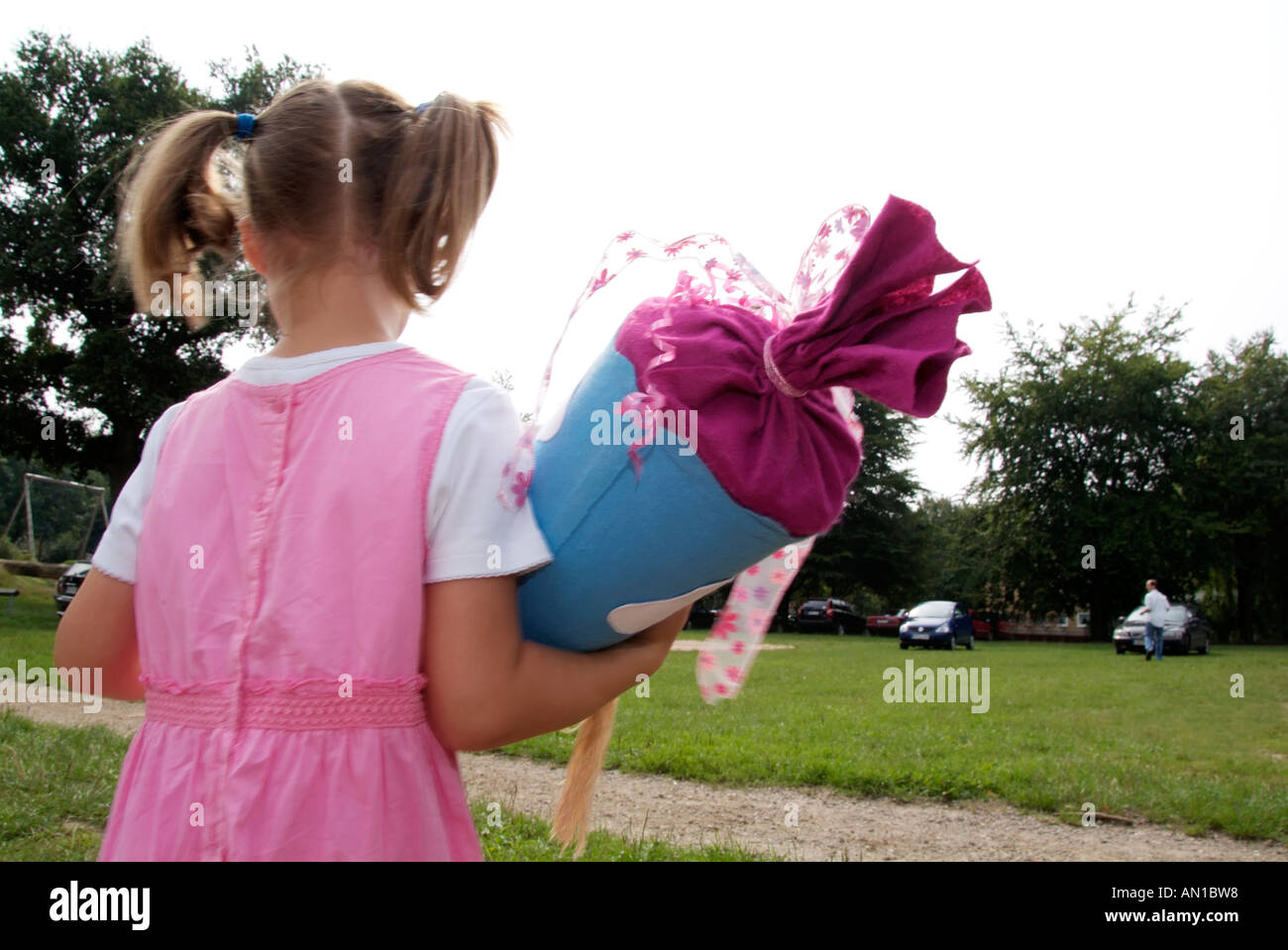 first grader Girl with schoolcone paper funnel schoolbag aspirations Einschulung Hamburg Germany Northern Europe first-grader Stock Photo