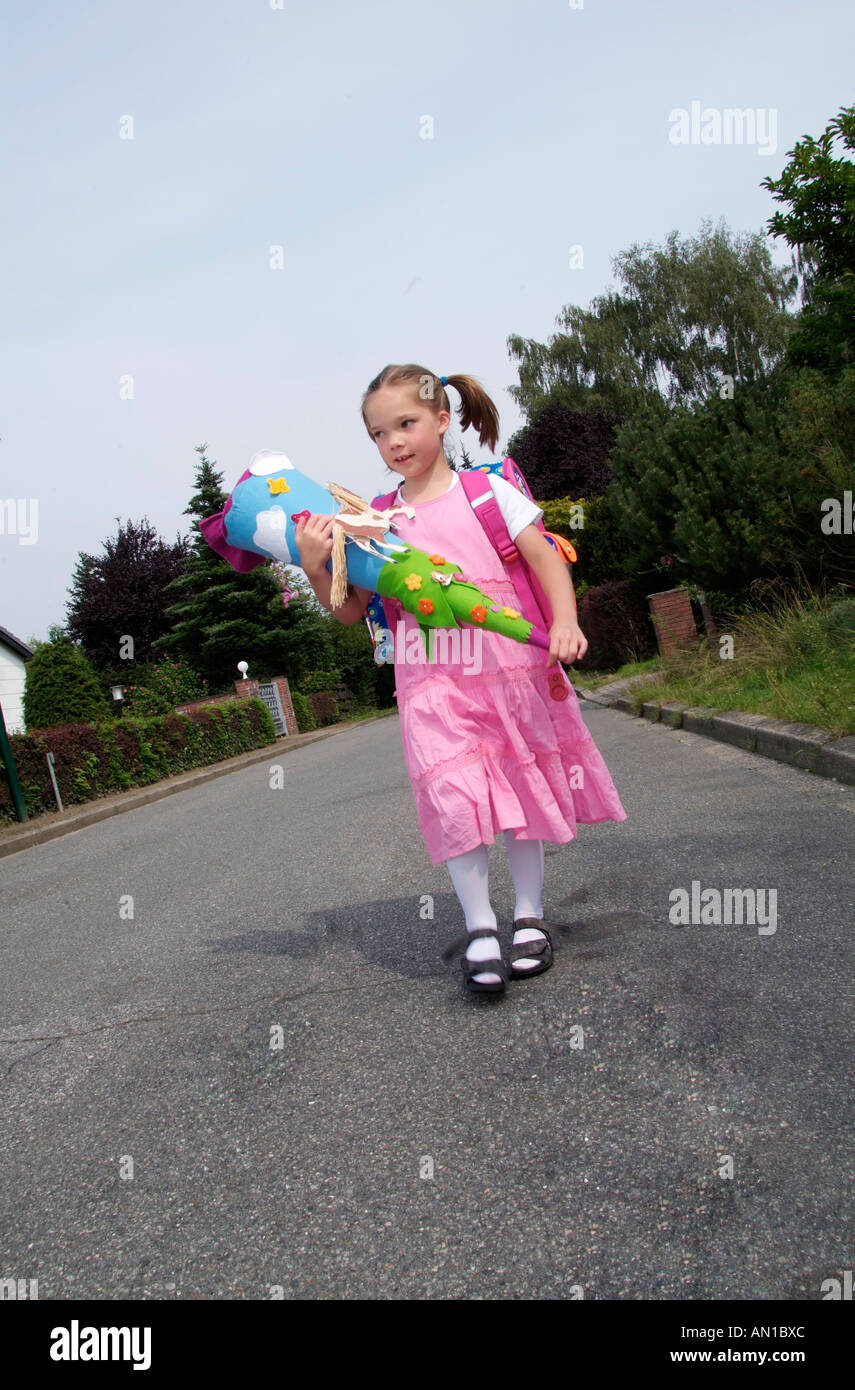 first grader Girl with schoolcone paper funnel schoolbag aspirations Einschulung Hamburg Germany Northern Europe first-grader Stock Photo