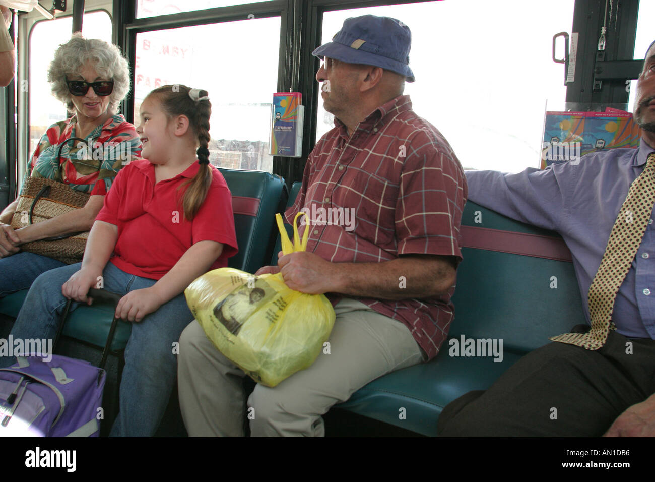 Miami Beach Florida,transportation,Electrowave,electric,public bus service,riders,passenger passengers rider riders,transportation,commuters,seats,rid Stock Photo