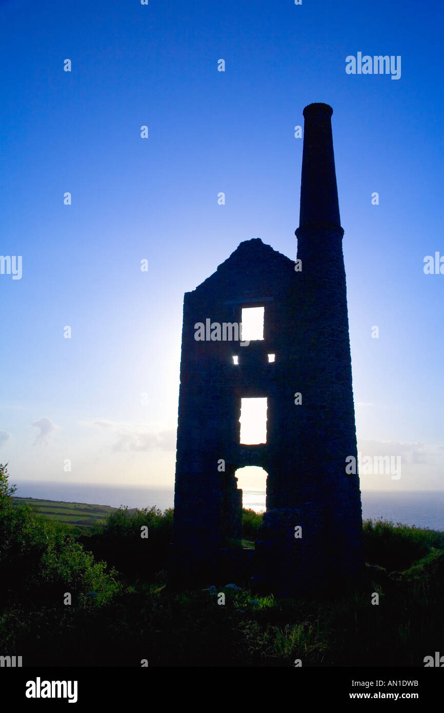 Ruined cornish engine house of Carn Galver Copper Mine in summer sunshine on the Atlantic Ocean at Bosigran Cornwall UK GB Stock Photo