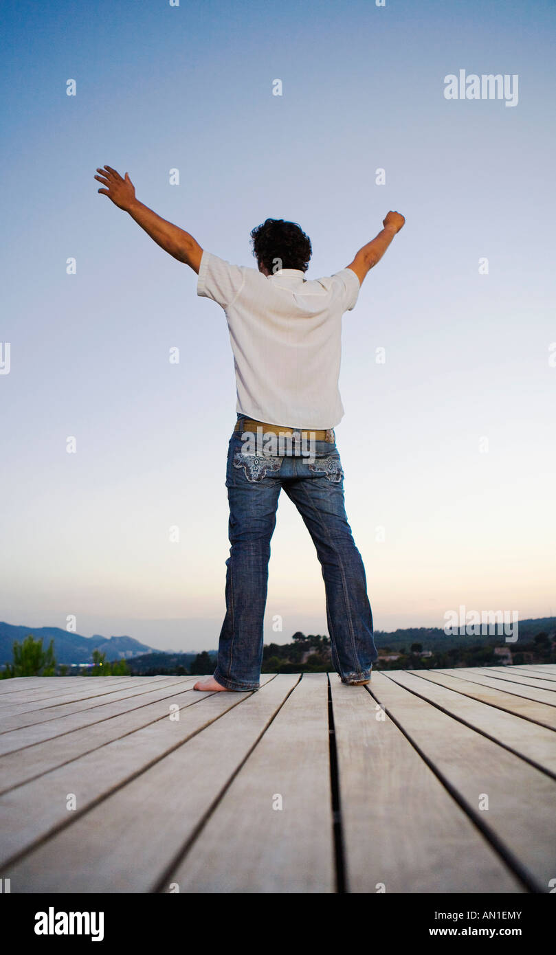 Man with arms outstretched hi-res stock photography and images - Alamy