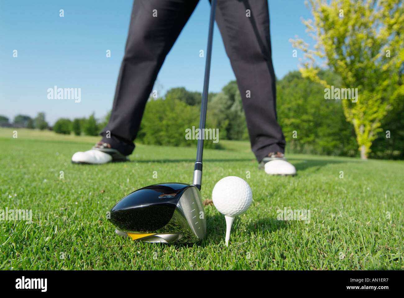 Golf Golfing Golfsport, detail of golfer hitting a golf ball on golf course Stock Photo