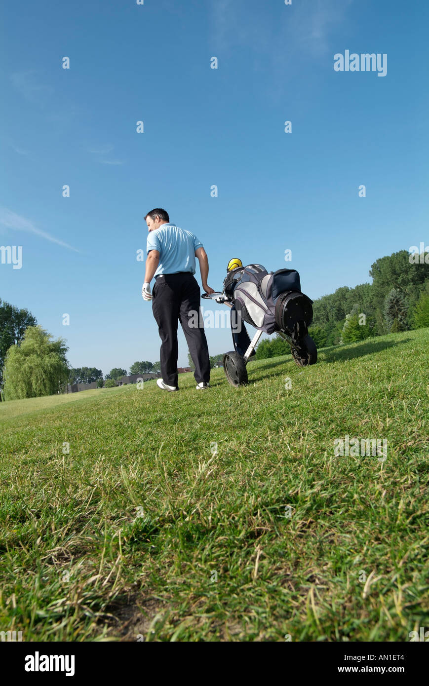 Golf Golfing Golfsport, detail of golfer on golf course Stock Photo