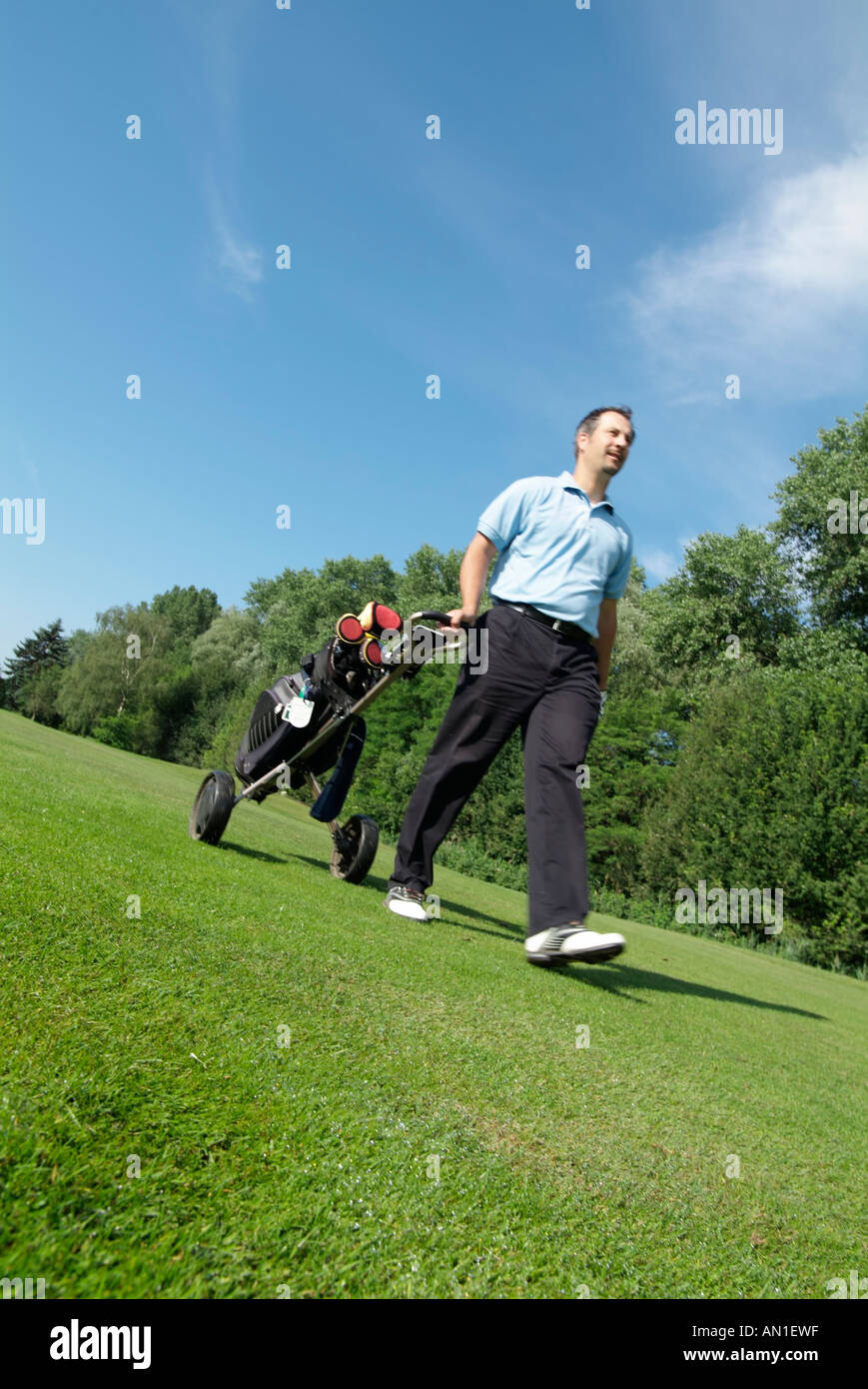Golf Golfing Golfsport, detail of golfer on golf course Stock Photo