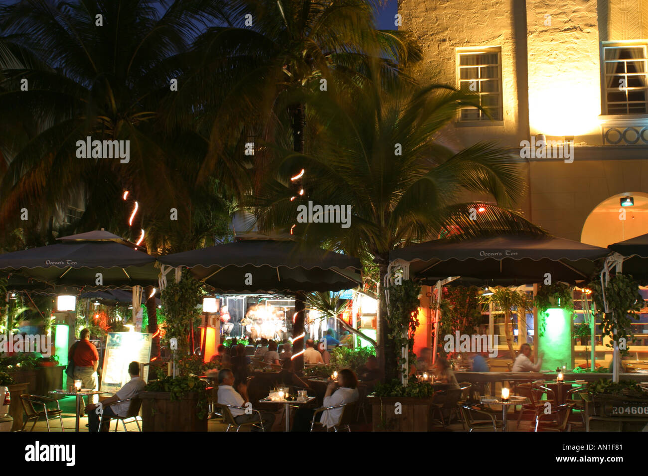 Miami Beach Florida,South Beach,Ocean Drive,al fresco sidewalk outside outdoors tables,dining,eating out,food,hotels,night nightlife evening after dar Stock Photo