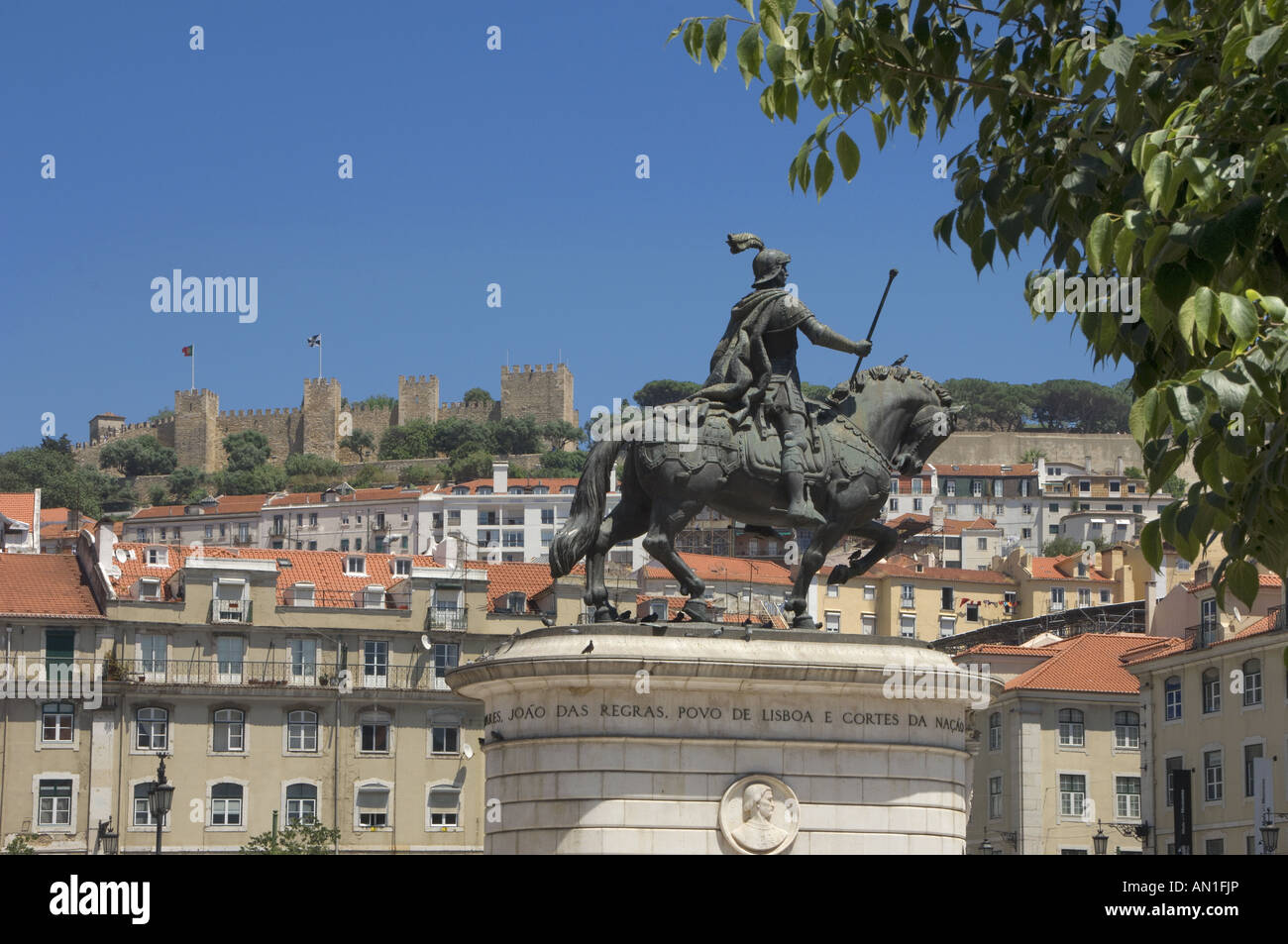 The equestrian statue of Dom Joao II in the Praca da Figueira square, central Lisbon, Portugal Stock Photo