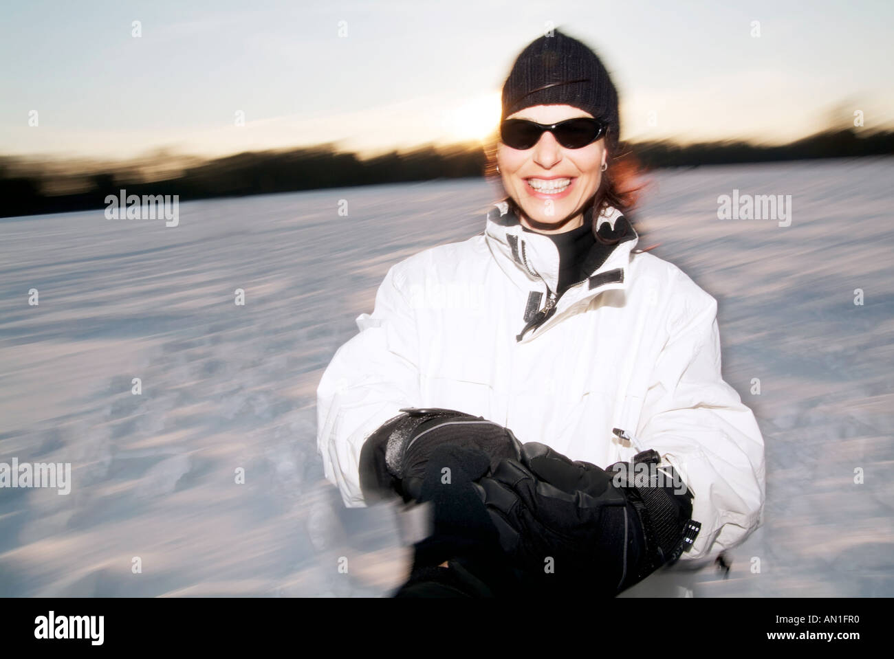 young woman enjoying snow in hamburg - Germany, fun, snowy, Lifestyle Stock Photo
