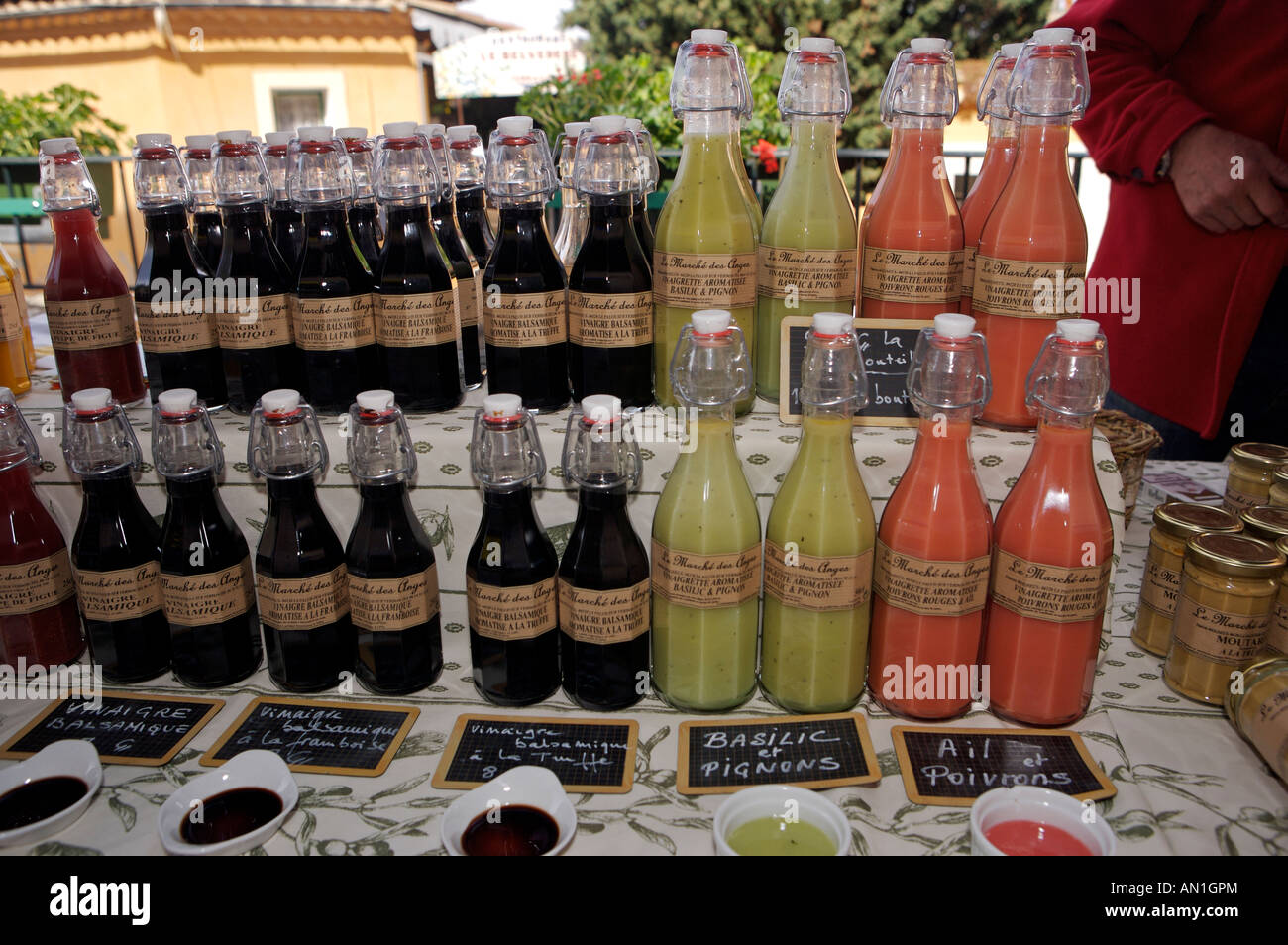 Vinegars and vinaigrettes on sale at a Market Stall in the village of Moustiers Ste Marie, Provence, France, Europe. Stock Photo