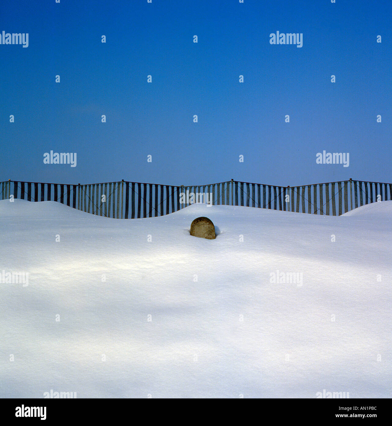 snow drift with fence Bavaria Germany Europe. Photo by Willy Matheisl Stock Photo