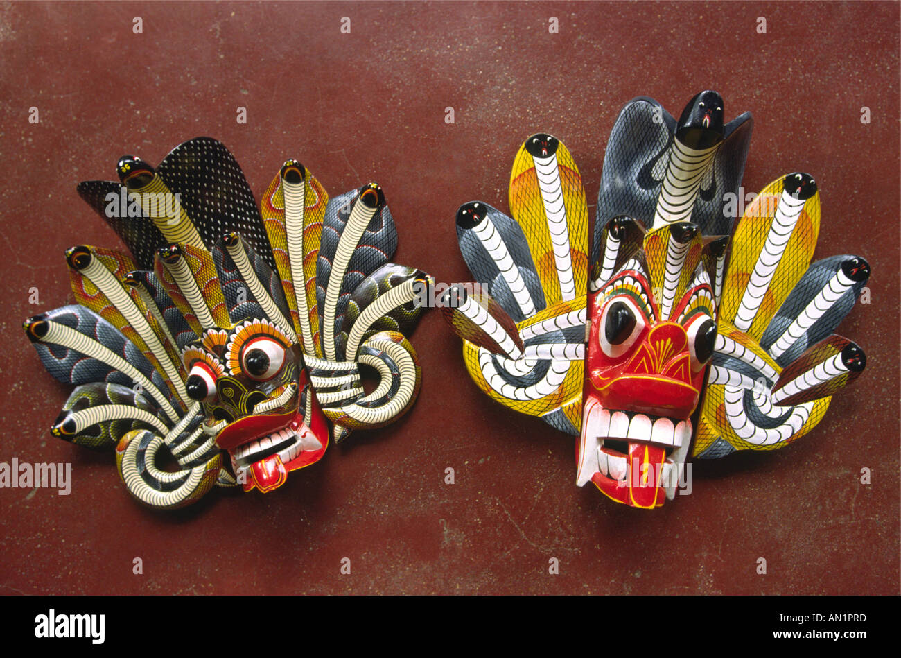 Sri Lanka Crafts traditional left and tourist quality right masks in comparison Stock Photo Alamy