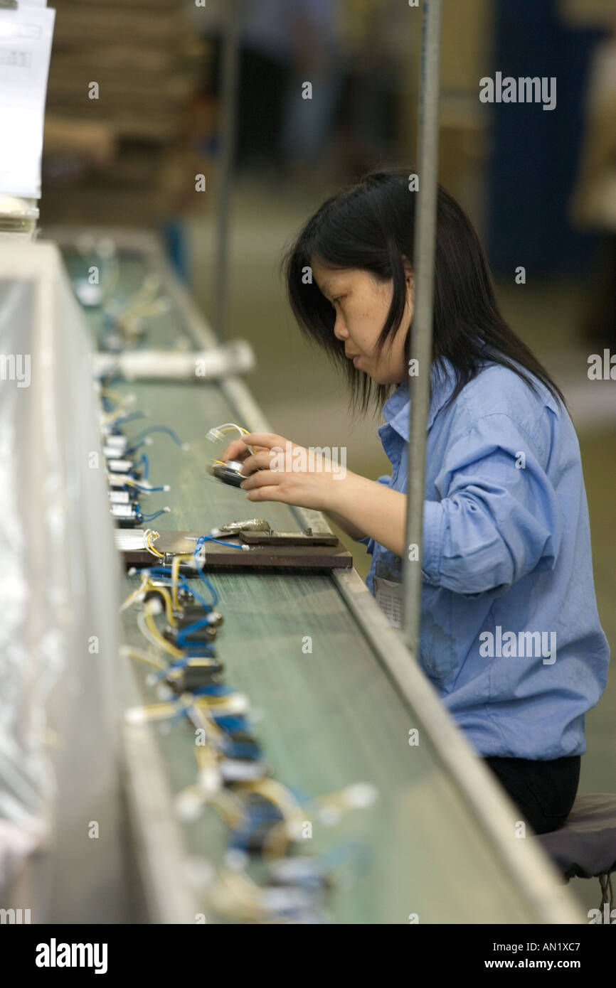Chinese Workers Manufacturing Transformers In A Factory Shanghai Stock