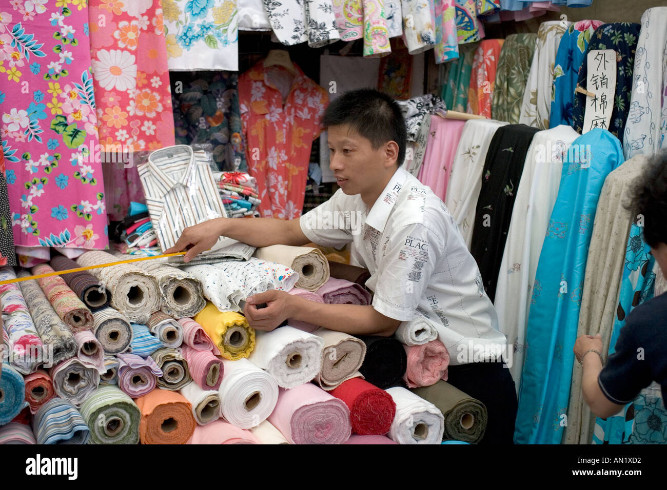 Fake Louis Vuitton, Chanel, Dior fabrics - Caoan Lu fabric market,  Shanghai, China Stock Photo - Alamy