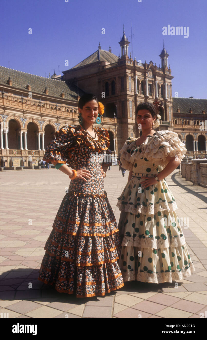 Plaza de Espana, Seville, with two women wearing traditional flamenco ...